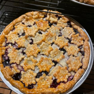 blueberry pie with stars on crust