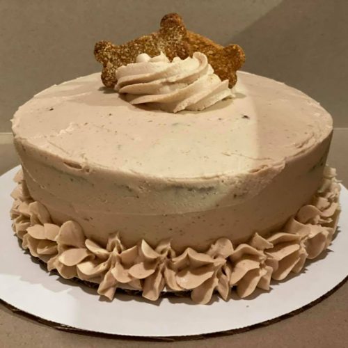 cake for dog with dog biscuits on top